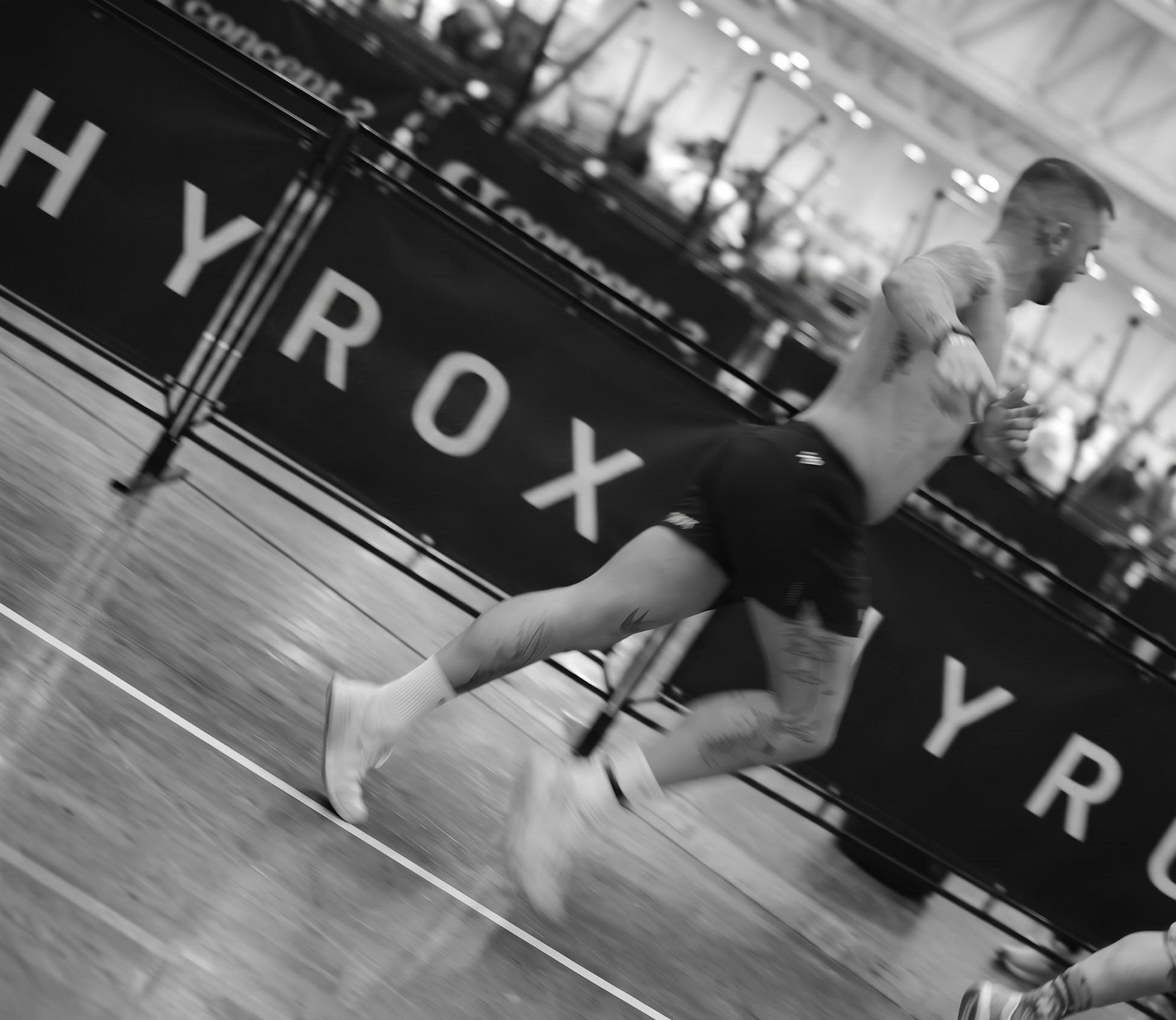 CreaGo athlete sprinting at a HYROX event